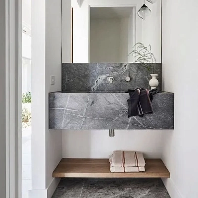 Консольная раковина из кварцевого агломерата под бетон