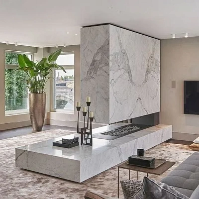 Отделка островного камина керамогранитом под камень