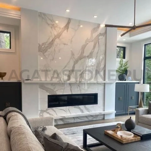 Отделка камина мрамором Calacatta на заказ